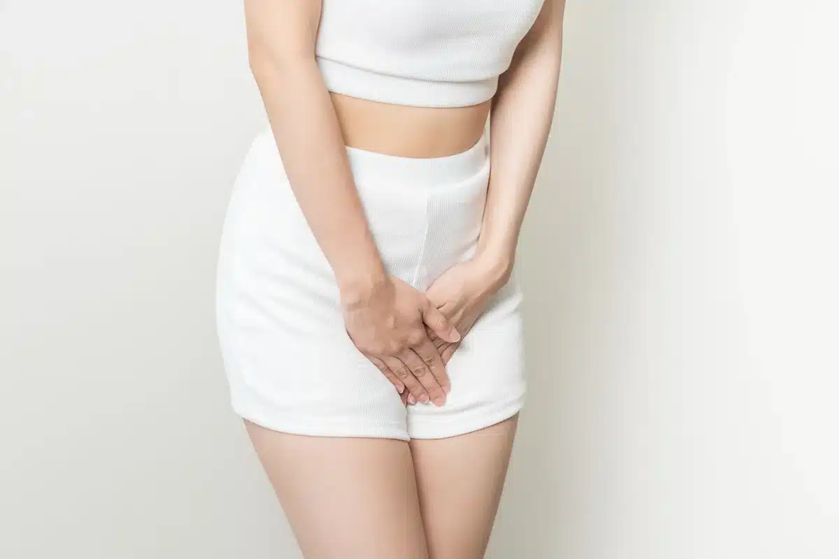 Woman experiencing discomfort.