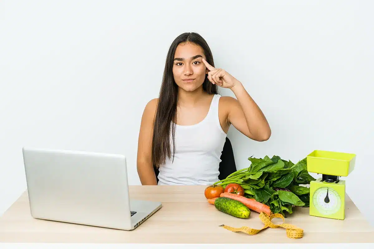 Young woman planning healthy meal.