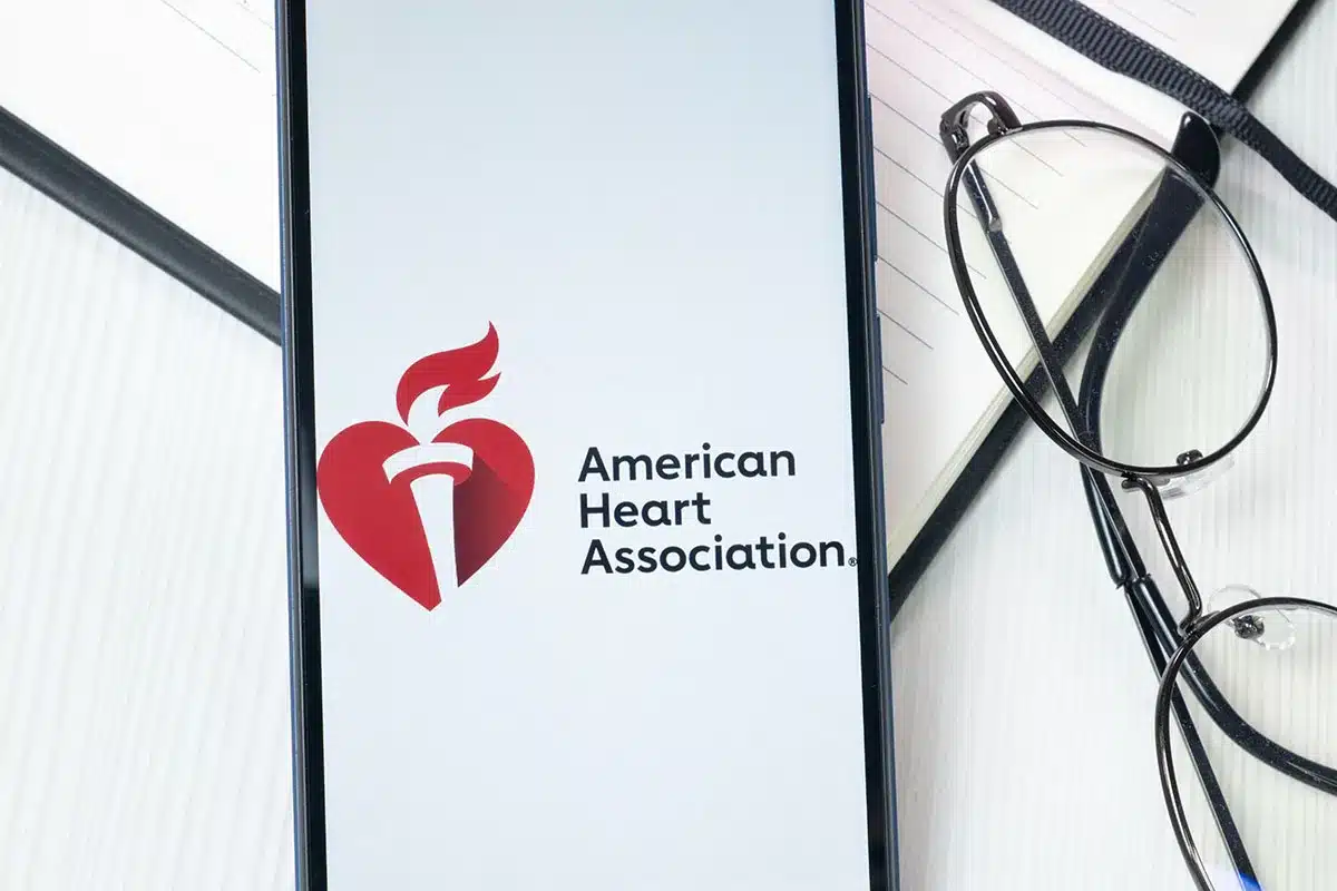 Smartphone displaying the American Heart Association logo.