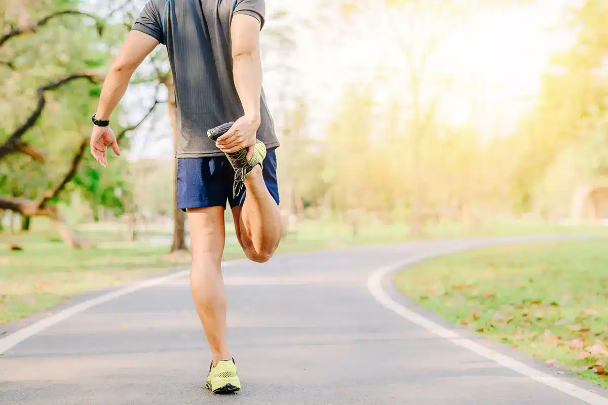 Man stretching outdoors.