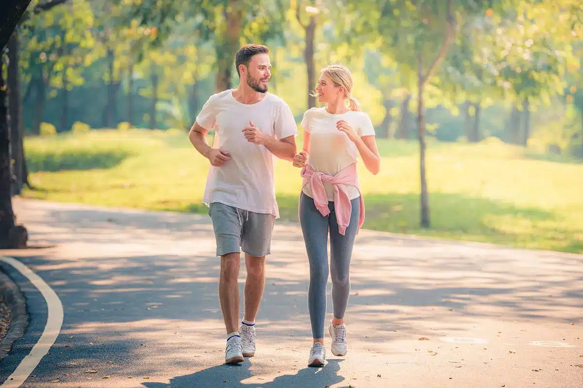 Couple jogging outdoors.