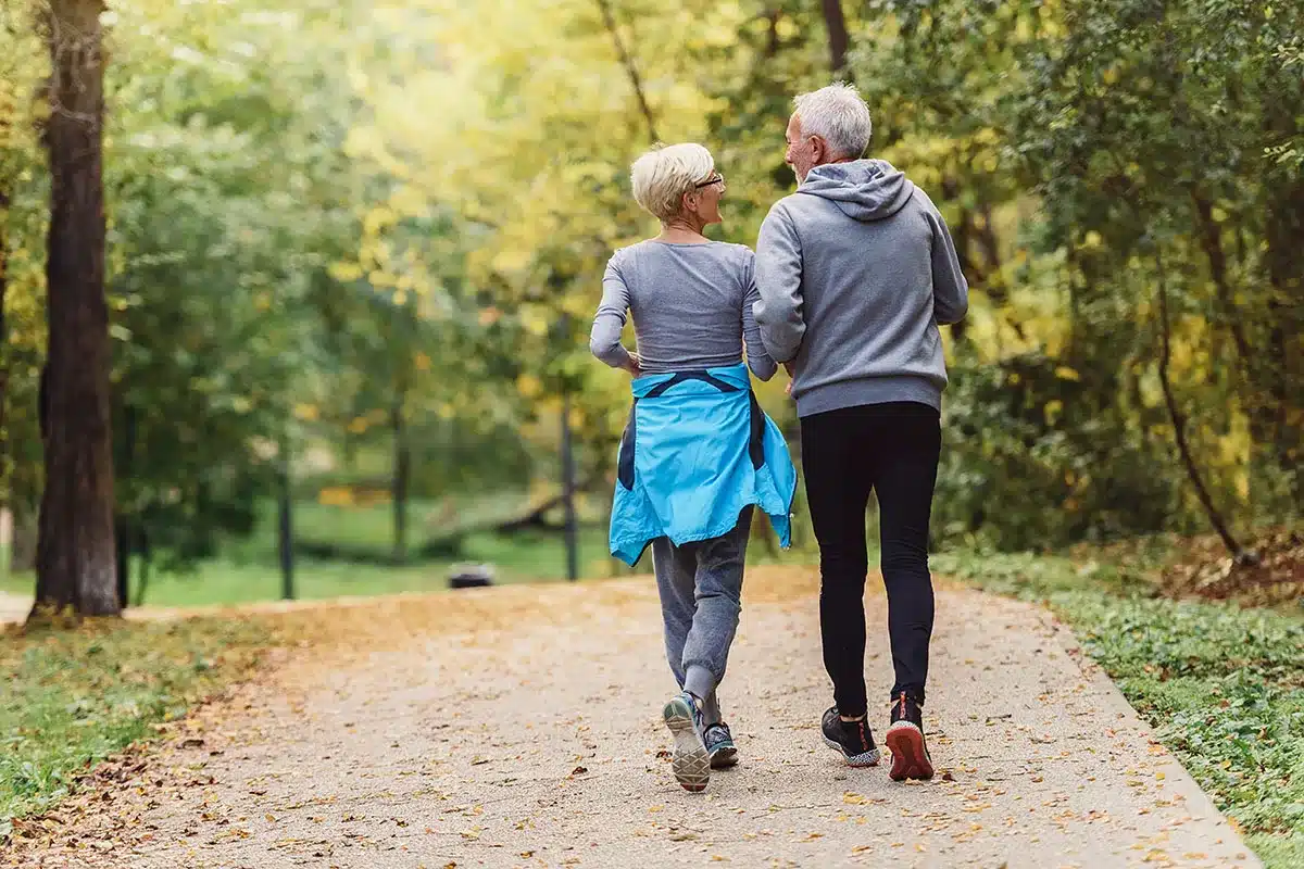Man and woman enjoying outdoor run.