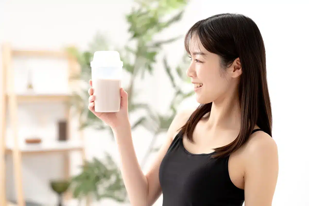 Woman with protein shake.