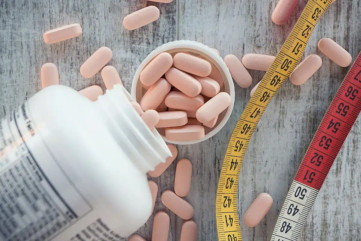 Pills and measuring tape.