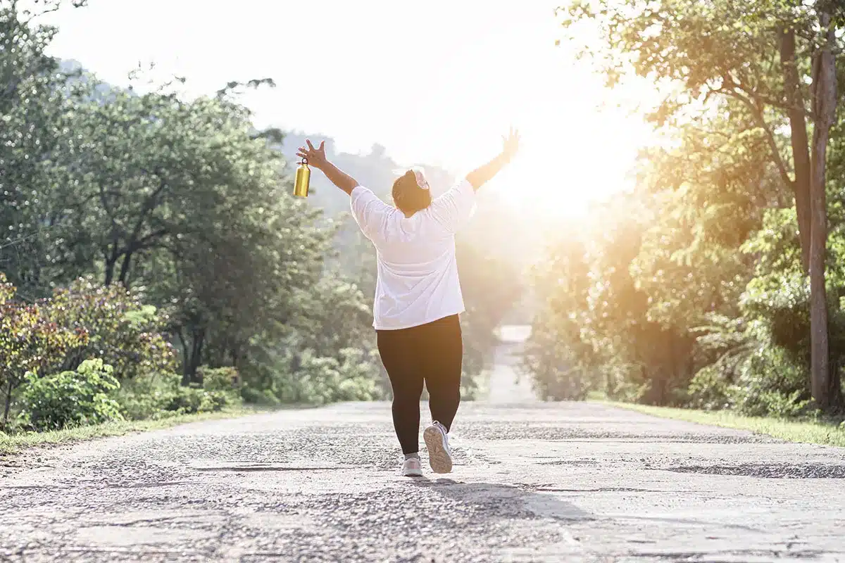 Woman celebrating after a run.