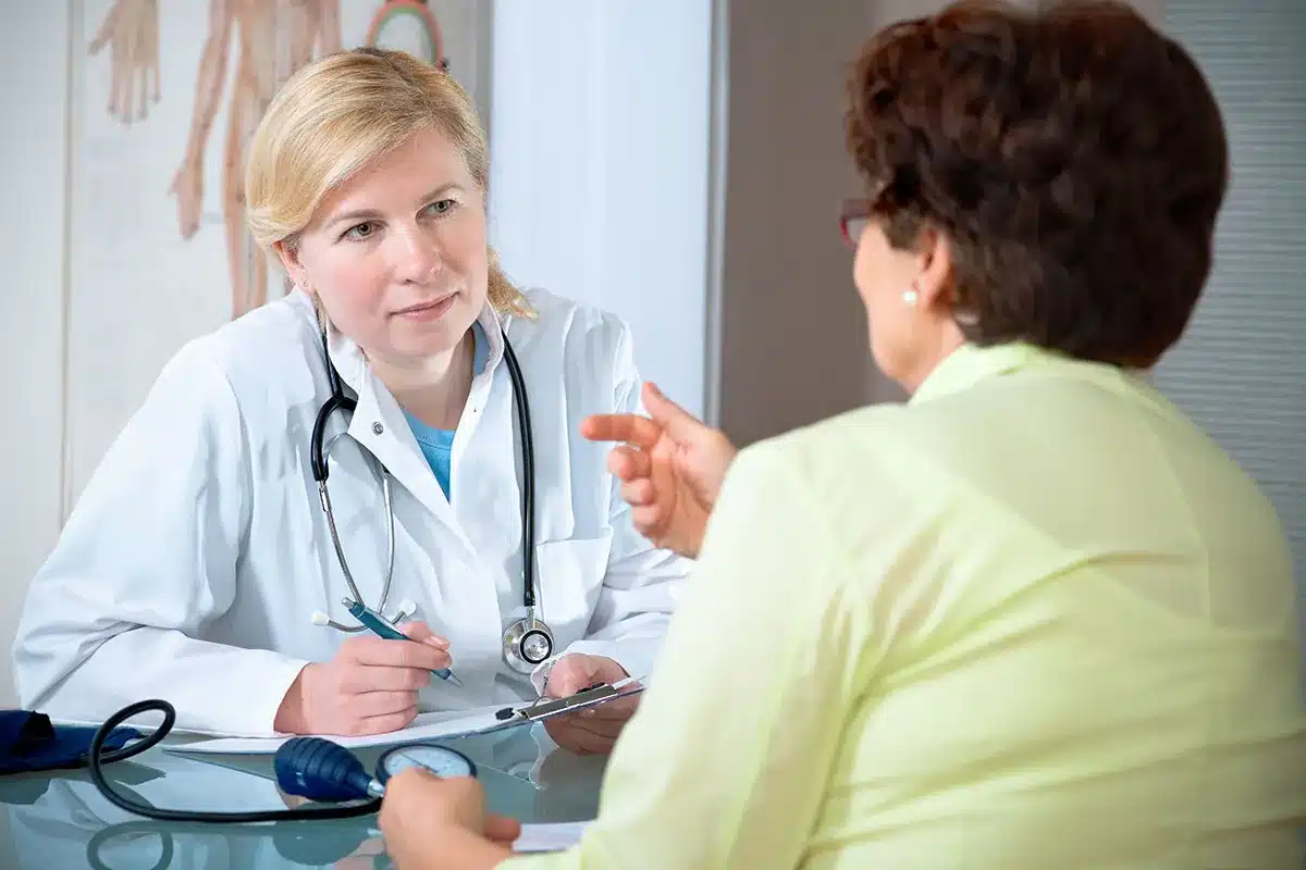 Doctor consulting with female patient.