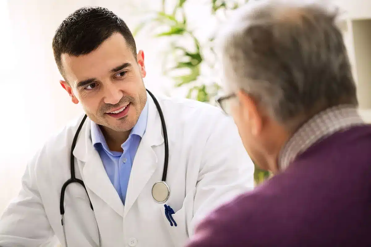 Doctor talking to senior patient.