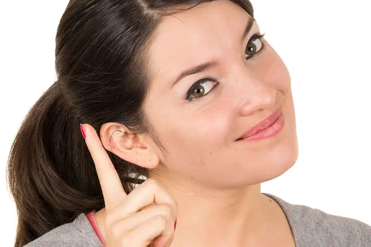 Woman pointing finger, idea concept.