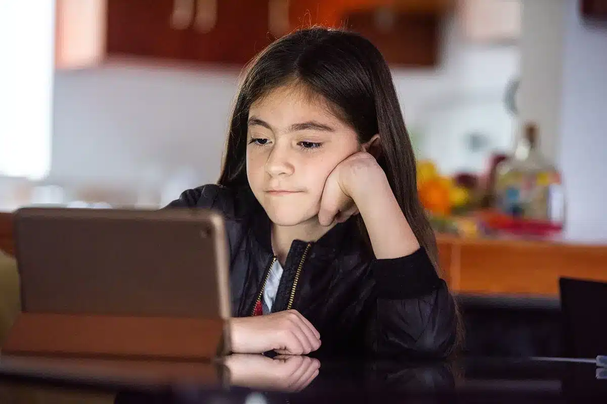 Girl using a tablet computer.