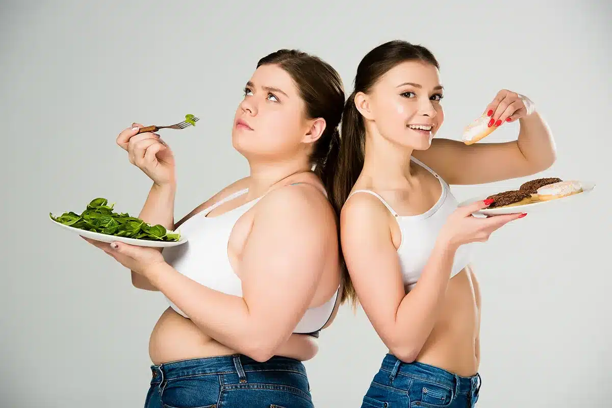 Two women, one overweight, one slim.